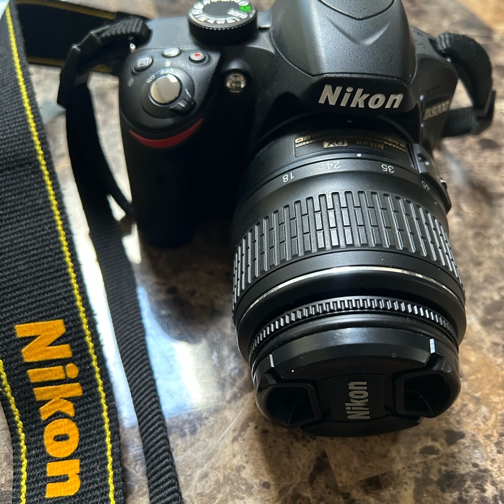 Nikon Black DSLR with Yellow Accents